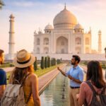 A licensed tour guide explaining the Taj Mahal to a small group of travelers during a private same-day tour from Delhi.