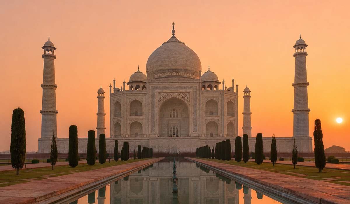 Taj Mahal at sunrise with golden light reflecting on the pool — Emperor Holidays sunrise tour from Delhi