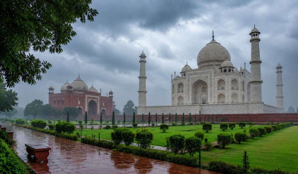 Taj Mahal during the monsoon season with dramatic clouds and lush gardens in the Golden Triangle Tour